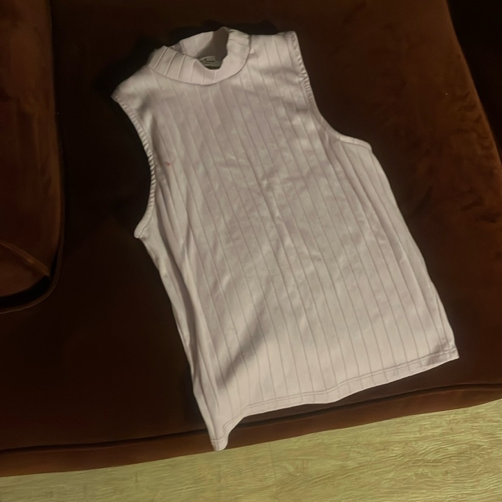 Purple sleeveless turtleneck